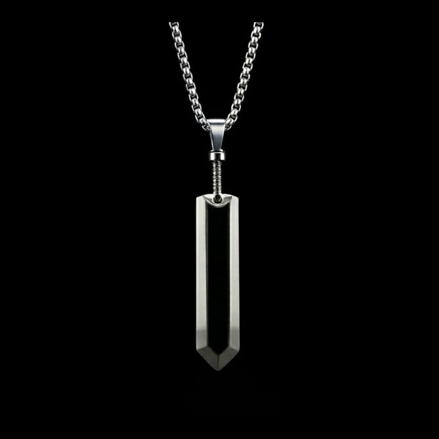 Silver pendant necklace on a black background