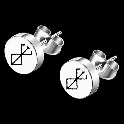 Silver stud earrings with black geometric design on a white background