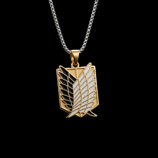 Gold and silver pendant with a unique design on a dark background