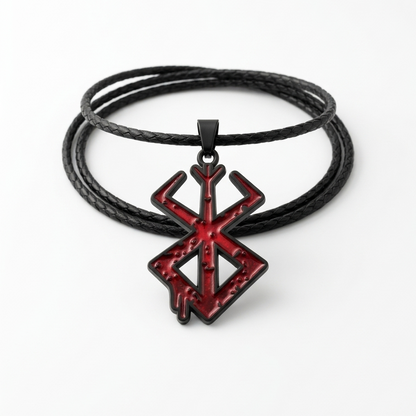 Black leather cord necklace with a red and black pendant on a white background