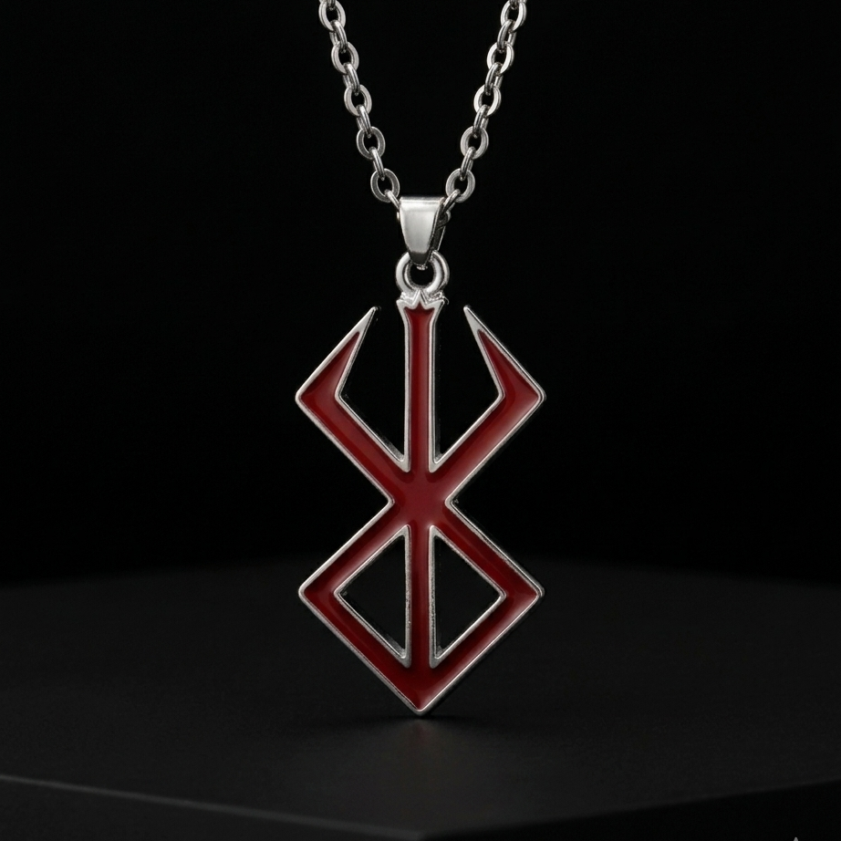 Red and silver pendant necklace on a black background